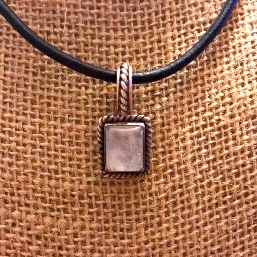 Silver pendant with moon stone.